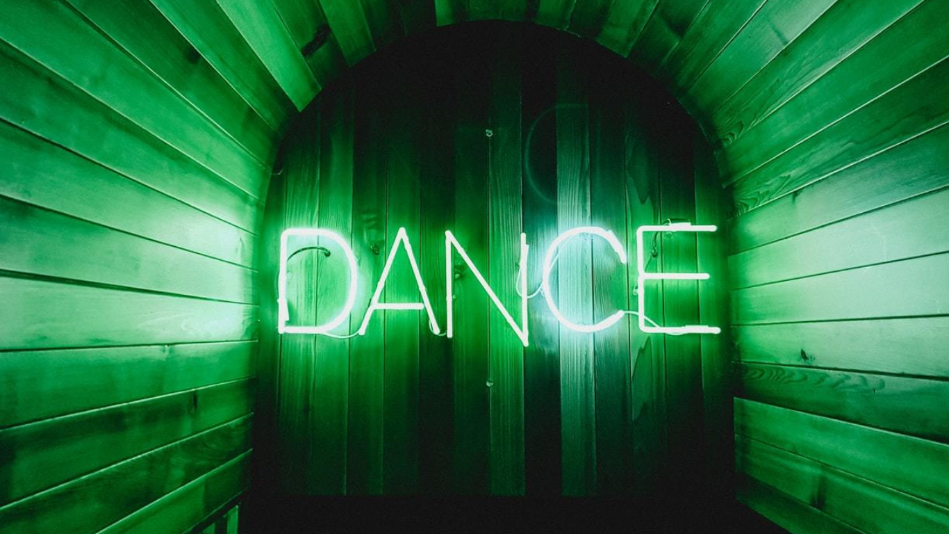 dance neon green sign