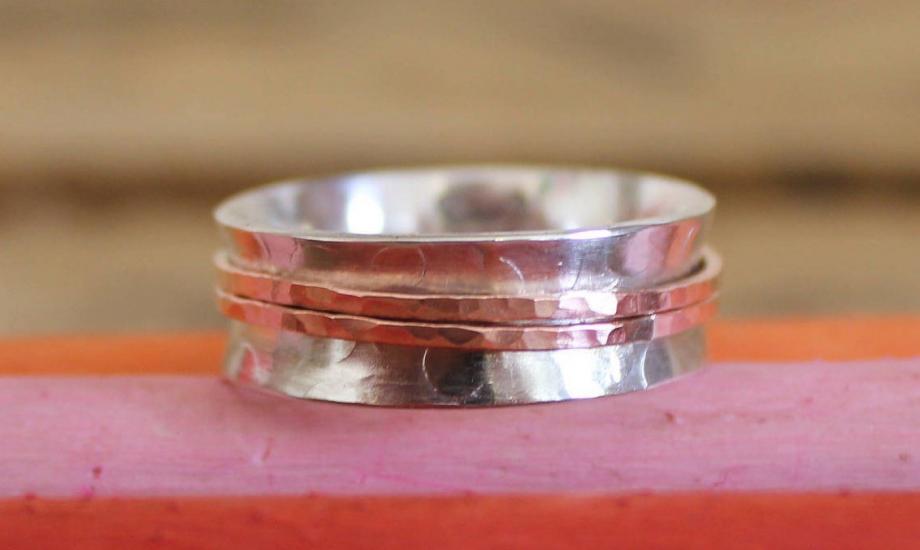A silver spinner ring 